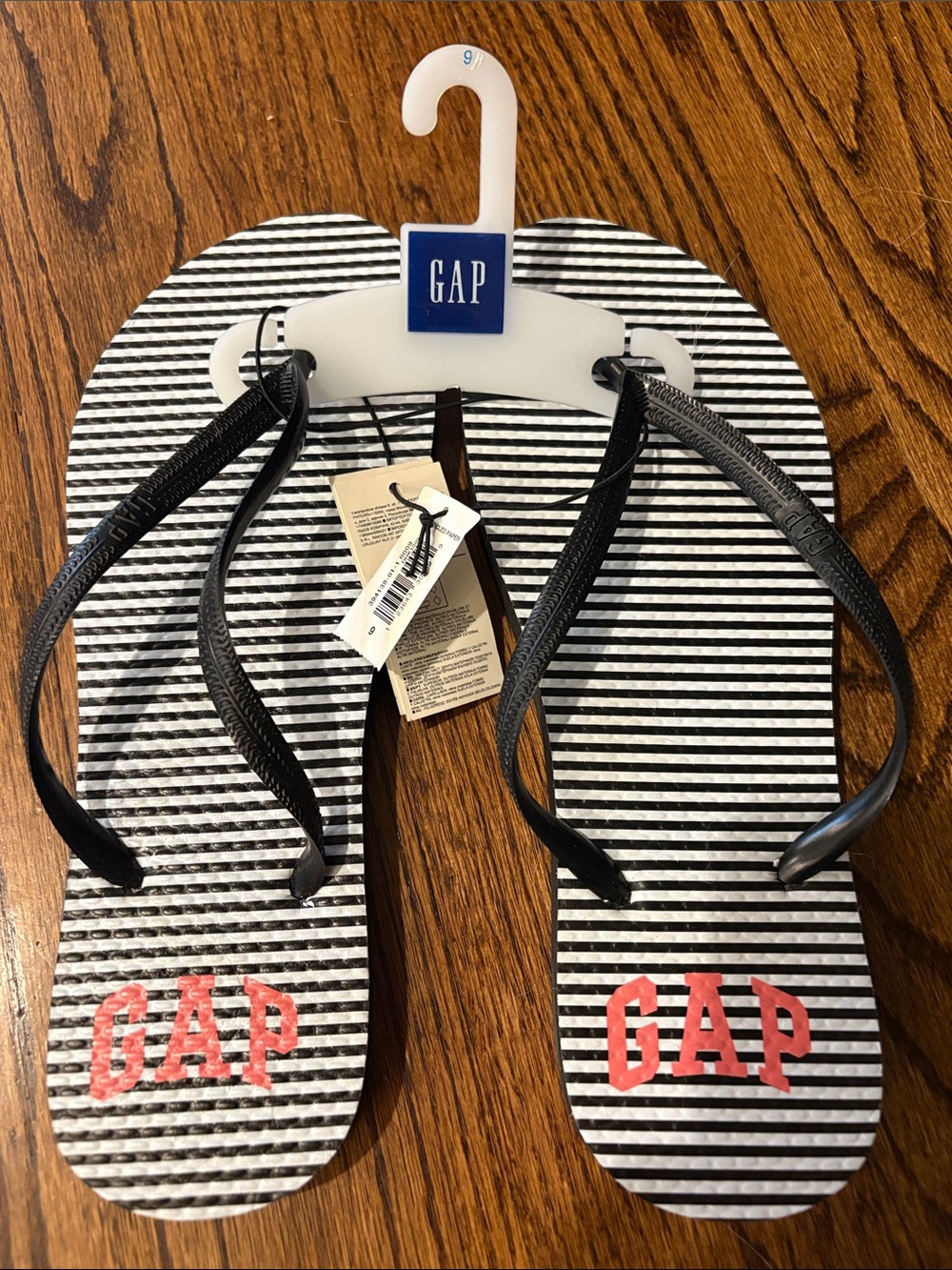 GAP Black & White Striped Flip Flops with Coral Logo size 9